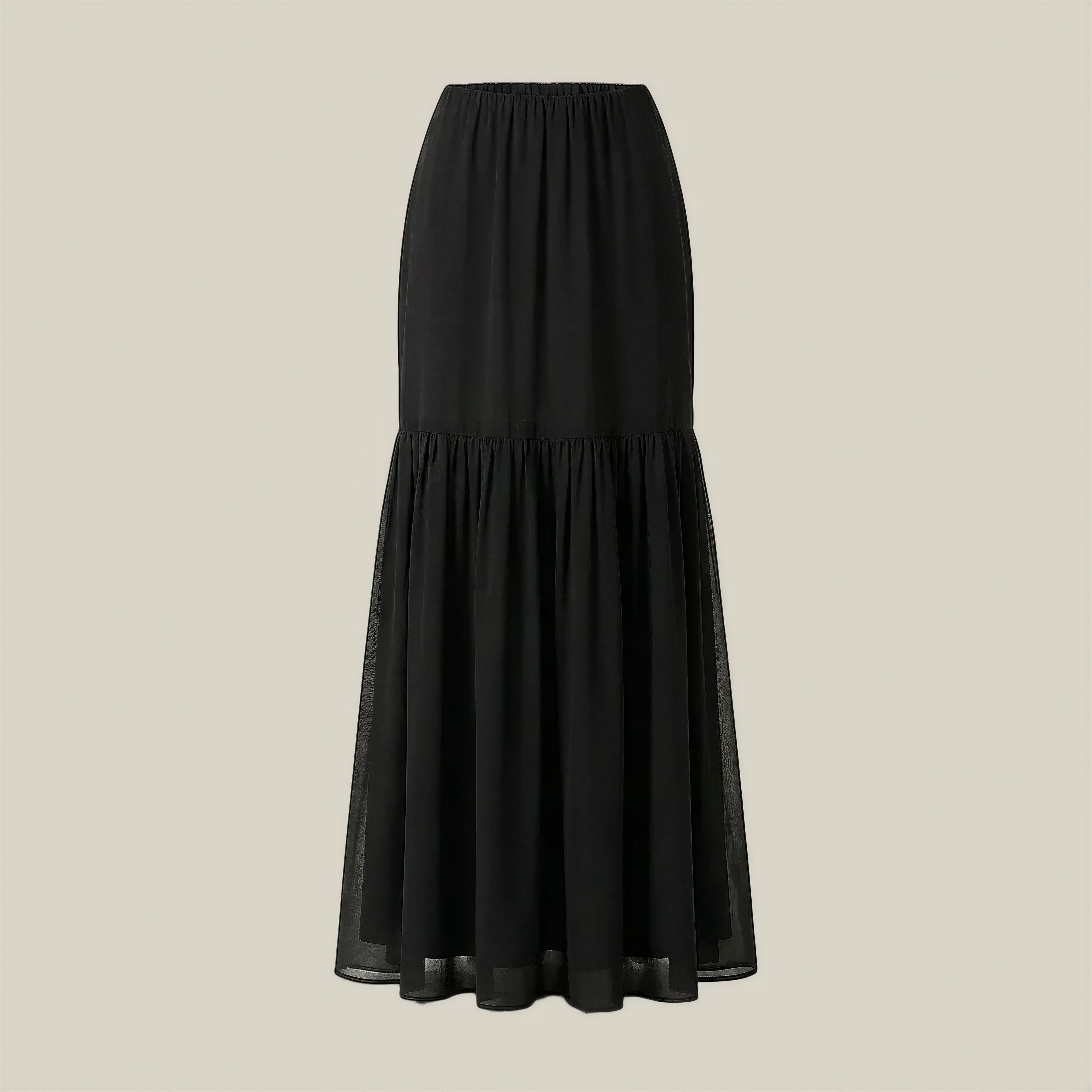 A black midi skirt with a gathered waistband and a tiered ruffle hem, displayed against a solid light beige background.