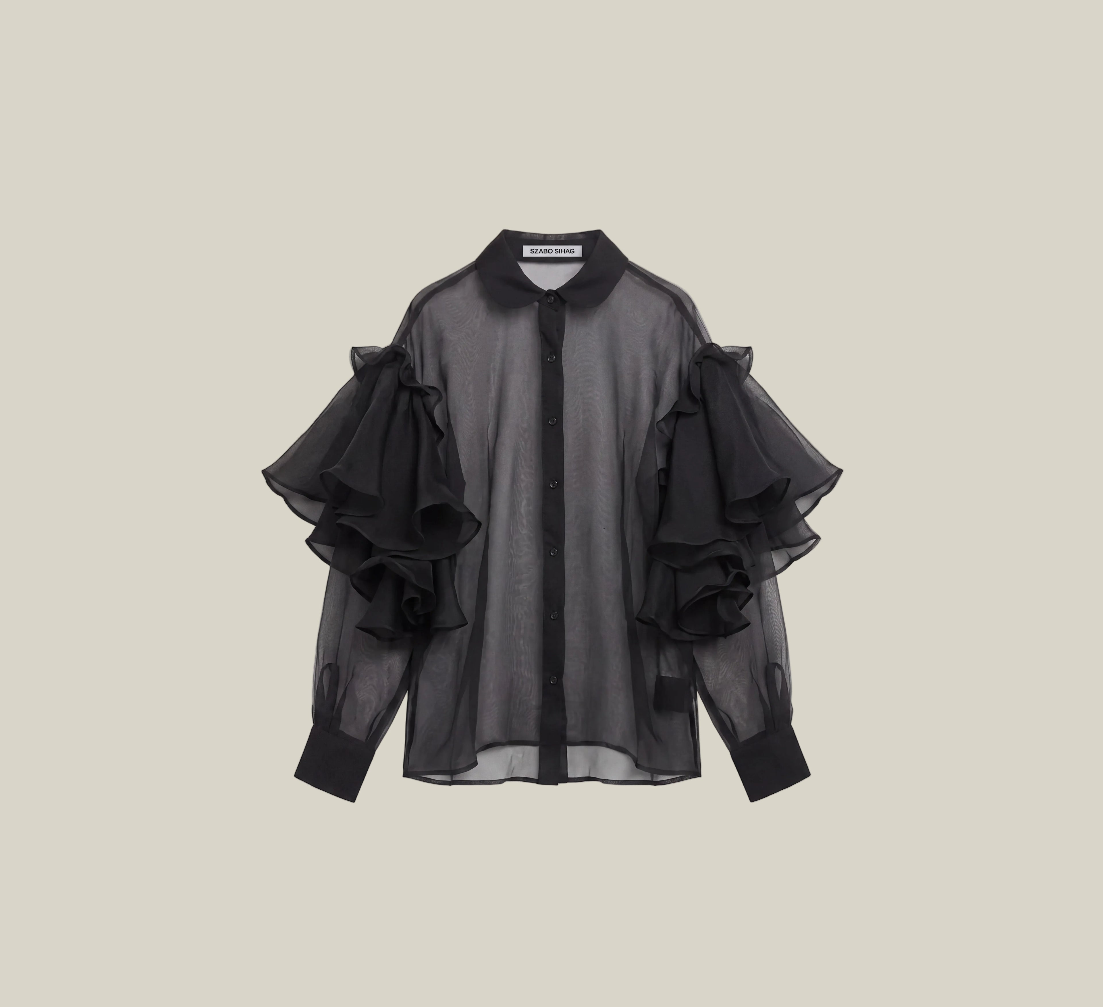 A black sheer long-sleeve blouse with dramatic layered ruffle sleeves, shown flat against a light beige background.