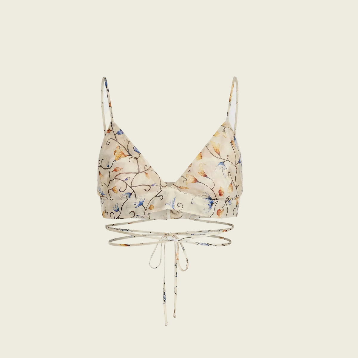 A beige triangle bralette with a delicate blue and orange floral pattern, featuring thin shoulder straps and a matching beige underwire band with a front tie closure, displayed against a solid white background.