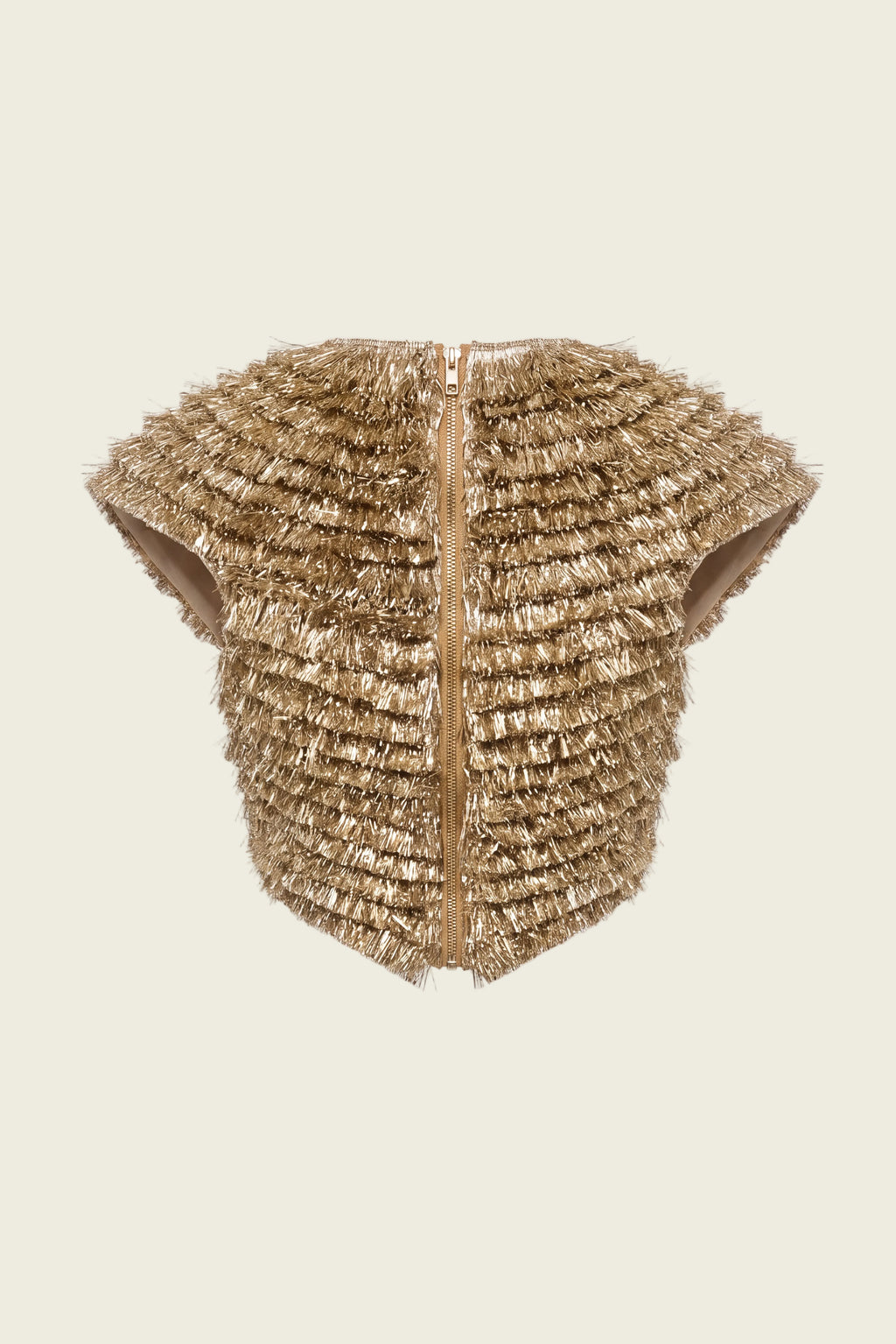 A cropped, sleeveless vest with a textured, frayed metallic gold finish, featuring a central vertical zipper and a structured silhouette, shown against a plain white background.