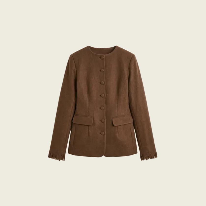 Brown handwoven wool jacket with button details on a beige background