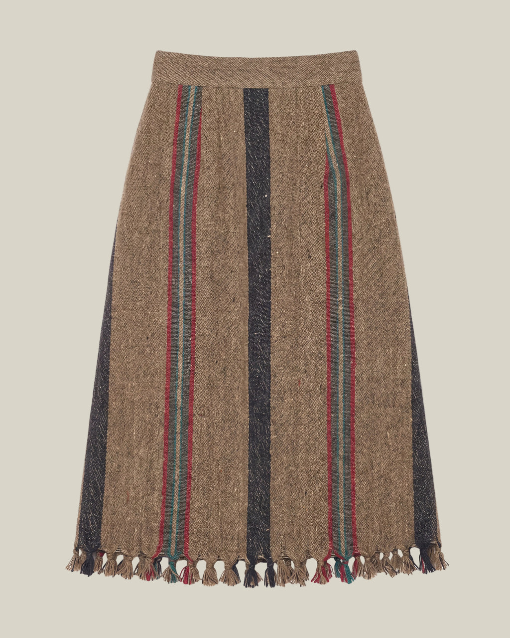 A brown wool skirt with vertical stripes in black, red, and green, finished with a fringed hem.