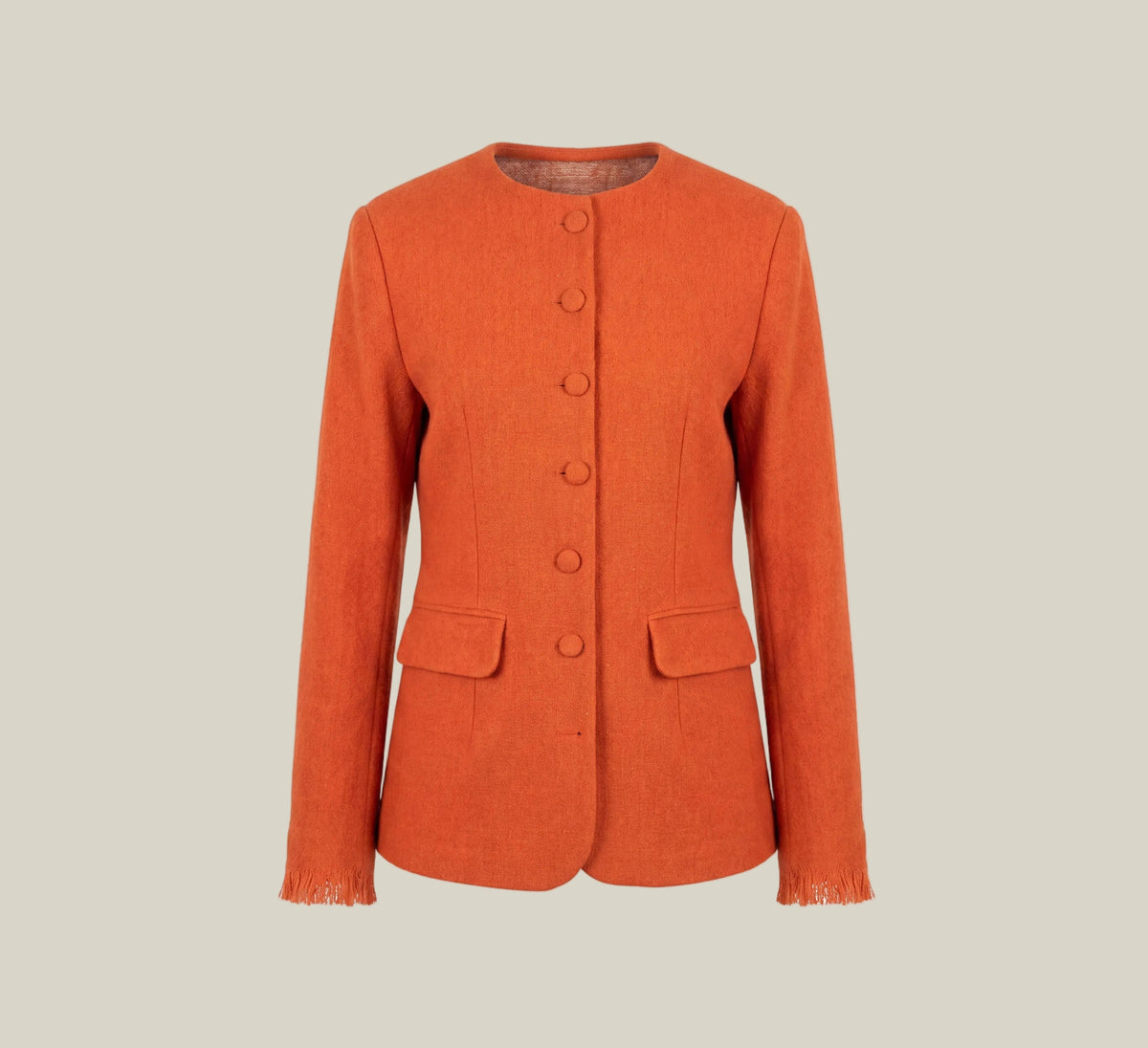 An orange textured jacket with a round neckline, button-front closure, and flap pockets, presented on a white card against a light beige background.