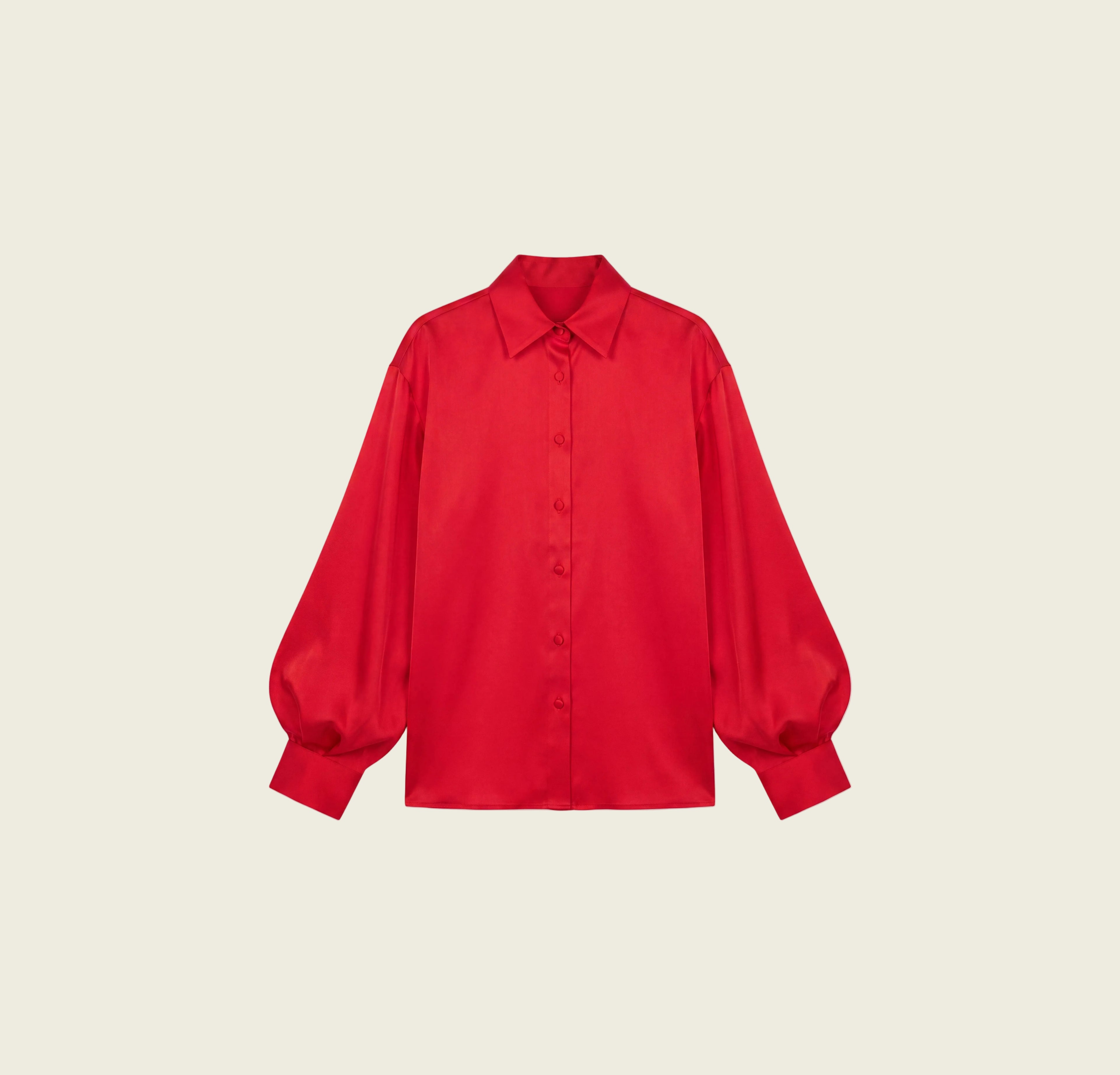 A bright red long-sleeve button-up shirt with a pointed collar and voluminous balloon sleeves, shown flat against a white background with a beige border.