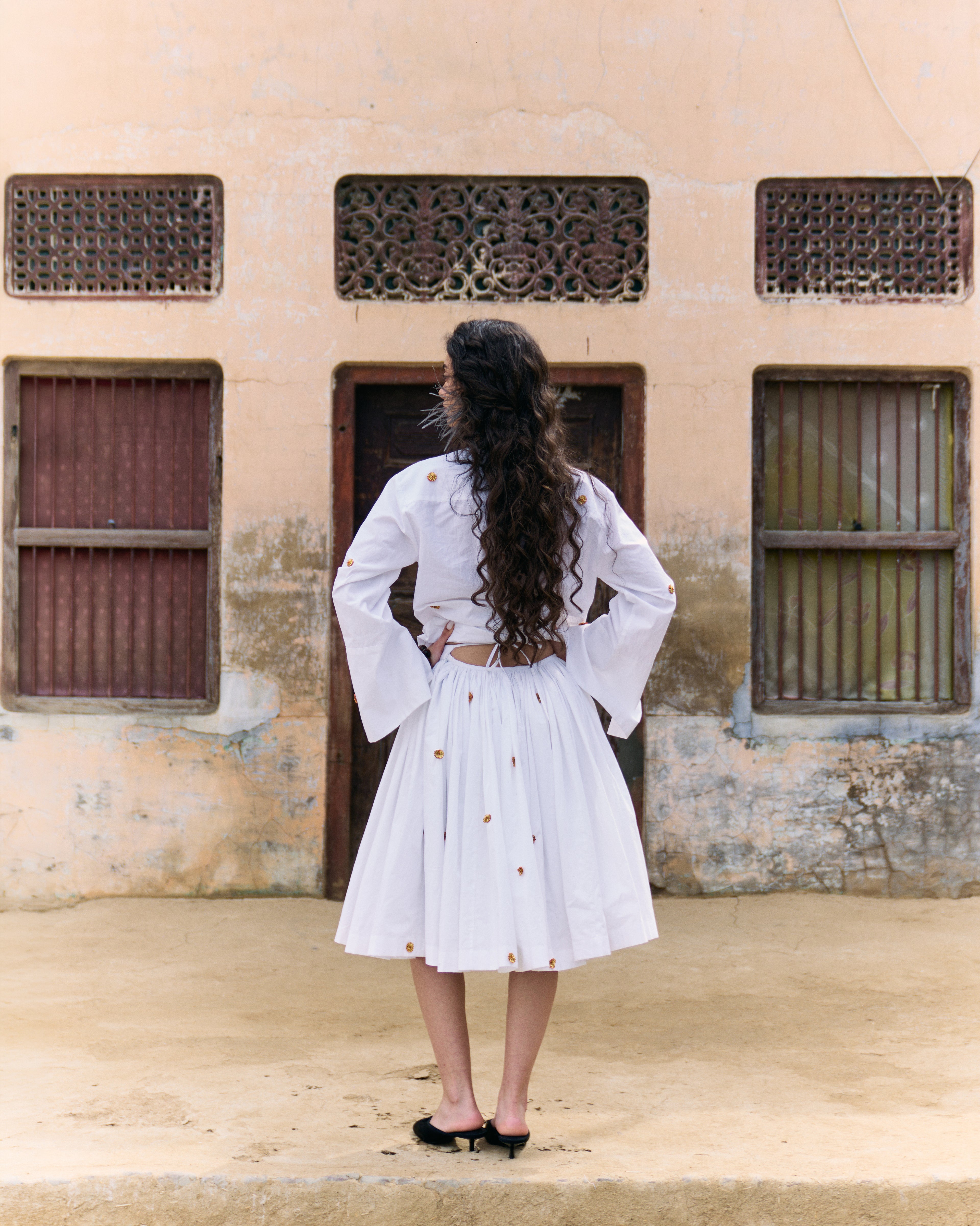 White pleated handwoven cotton skirt