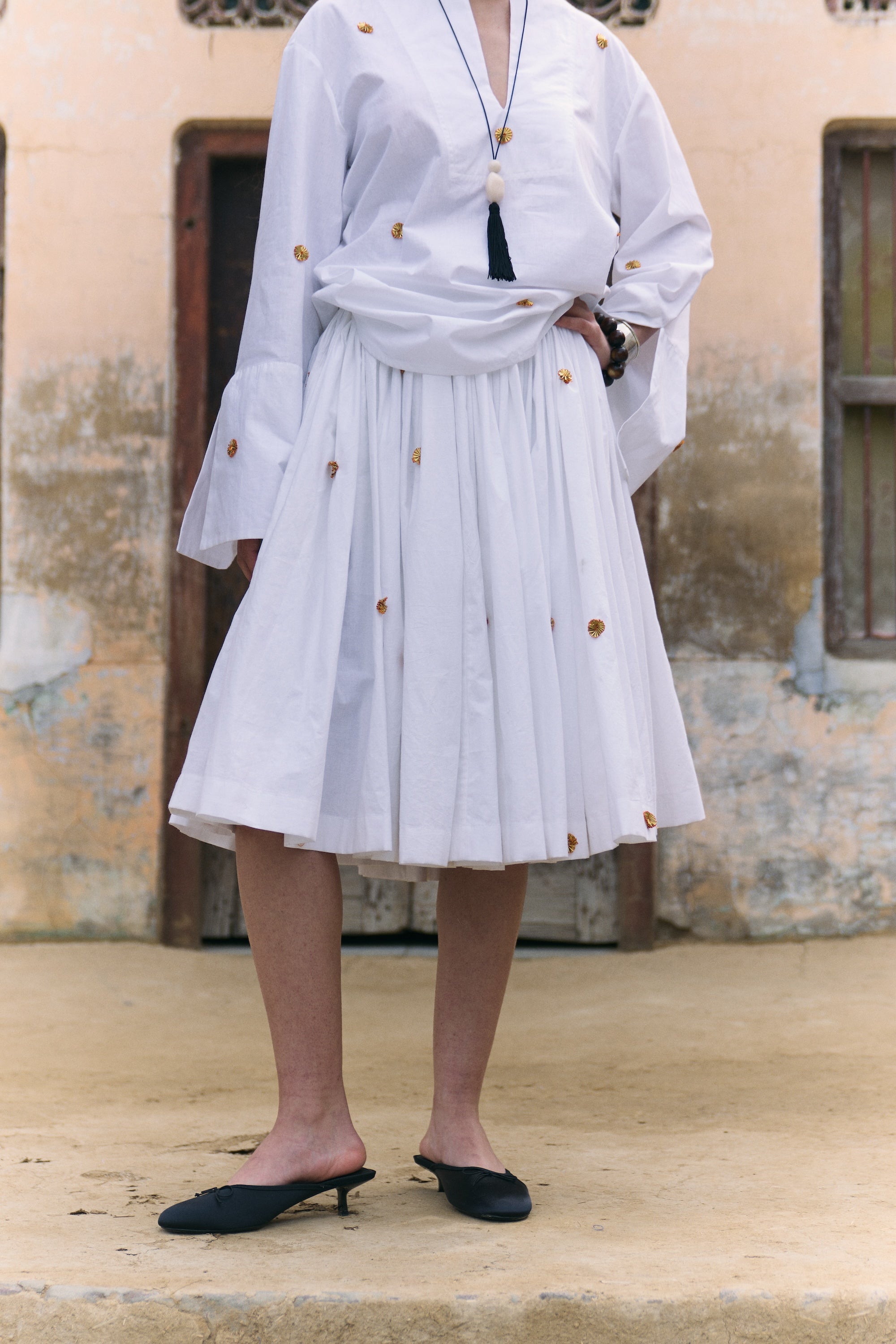 White pleated handwoven cotton skirt